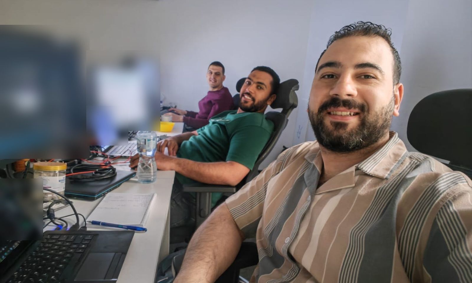 Stark Technology engineers working together in the office