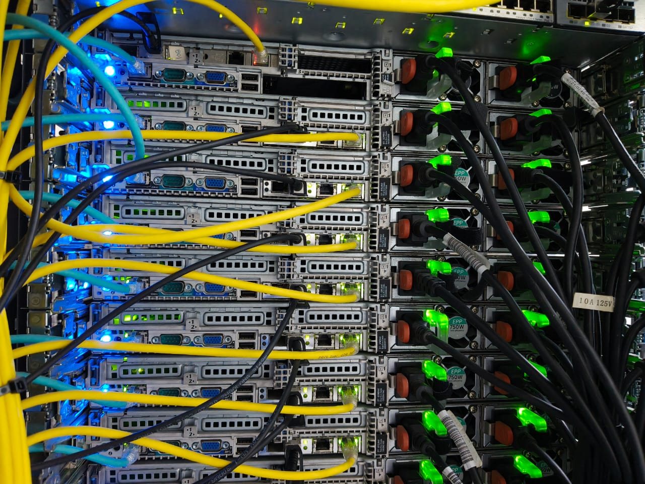 Routed, dressed and labelled cabling at the rear of a data center rack