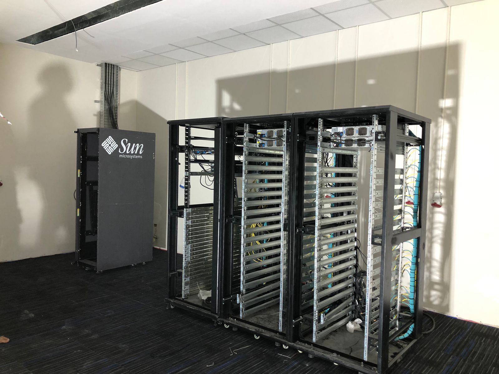 Empty racks at the start of a data center build by Stark Technology