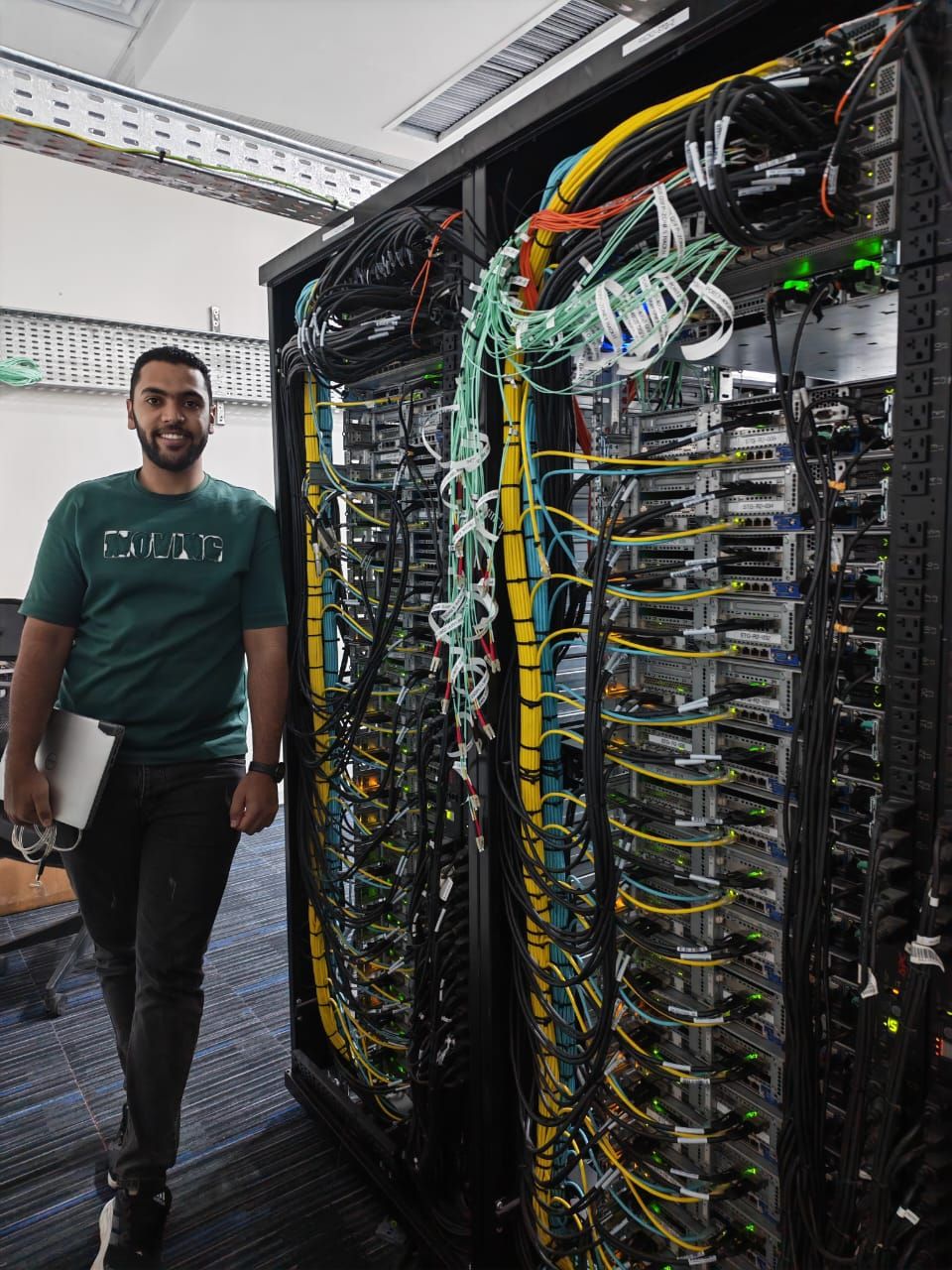 A Stark Technology engineer at a live network rack