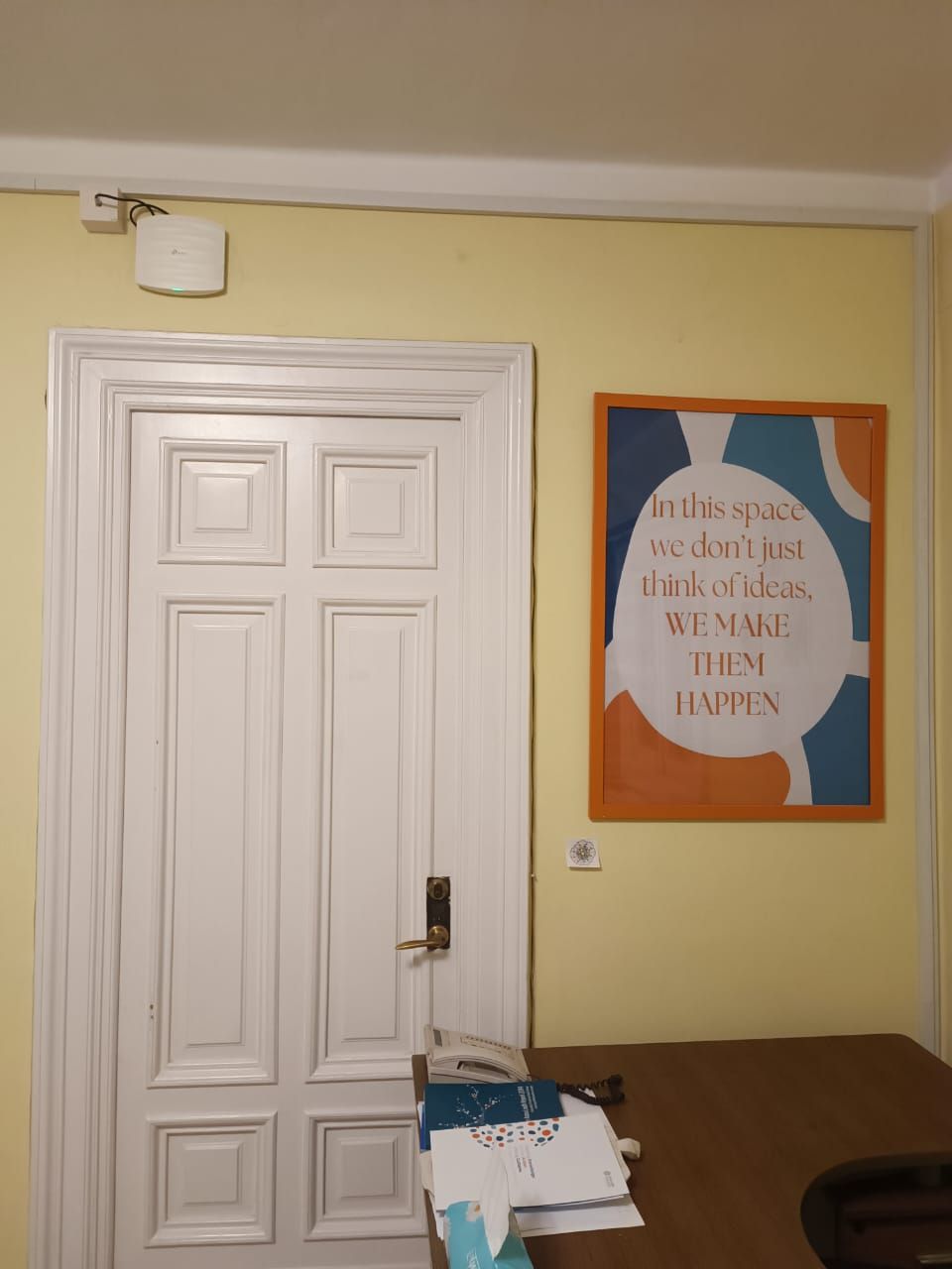 Wall art at the Stark Technology office reading: in this space we do not just think of ideas, we make them happen