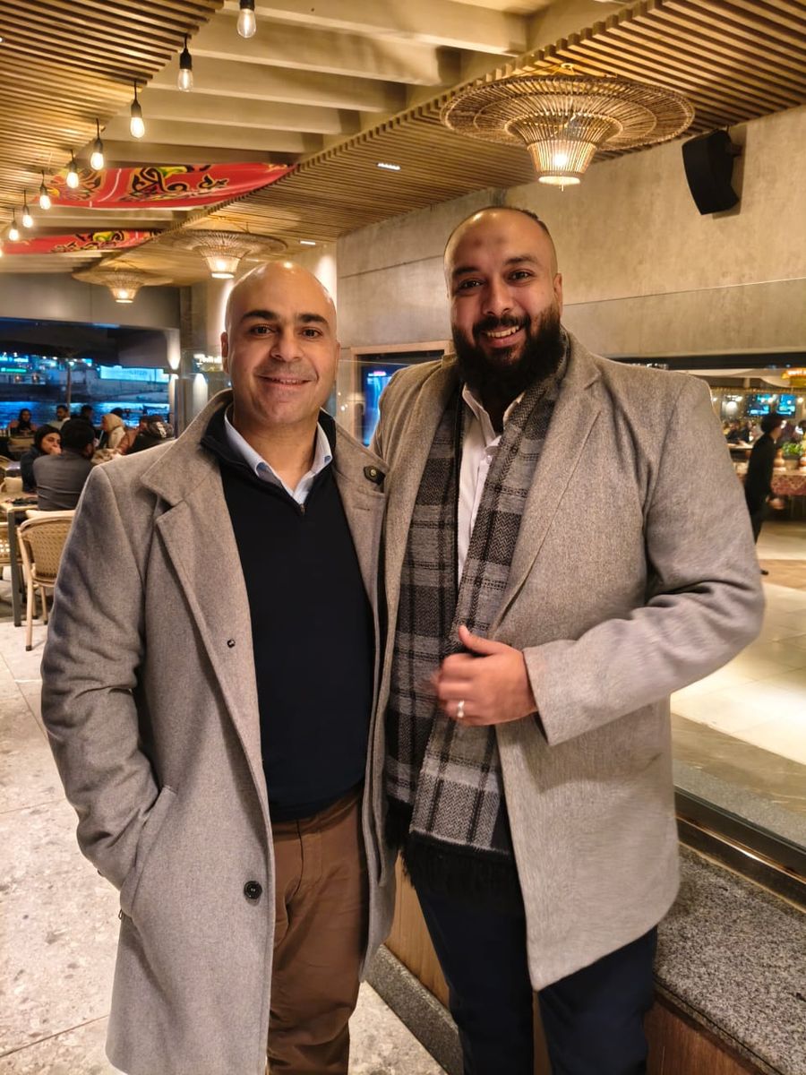 Two Stark Technology colleagues at a company event