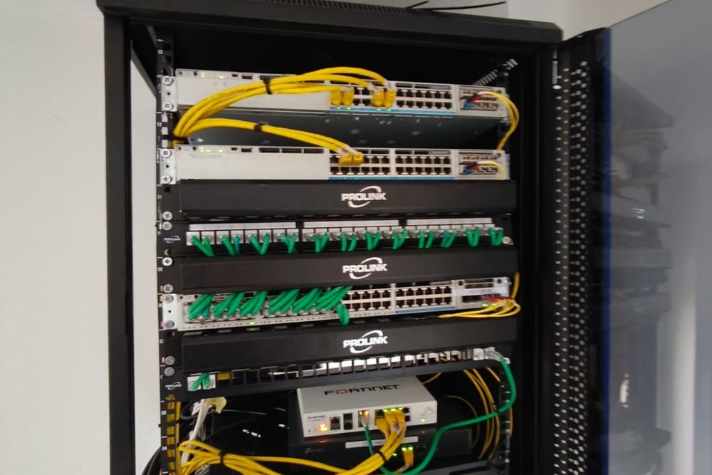 An edge network cabinet built and patched by Stark Technology