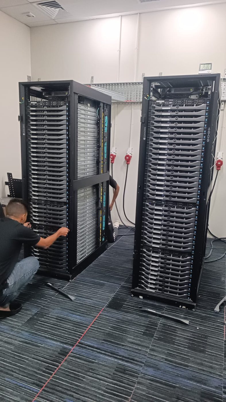 Stark Technology engineers installing Dell PowerEdge servers into racks during a data centre build in Egypt