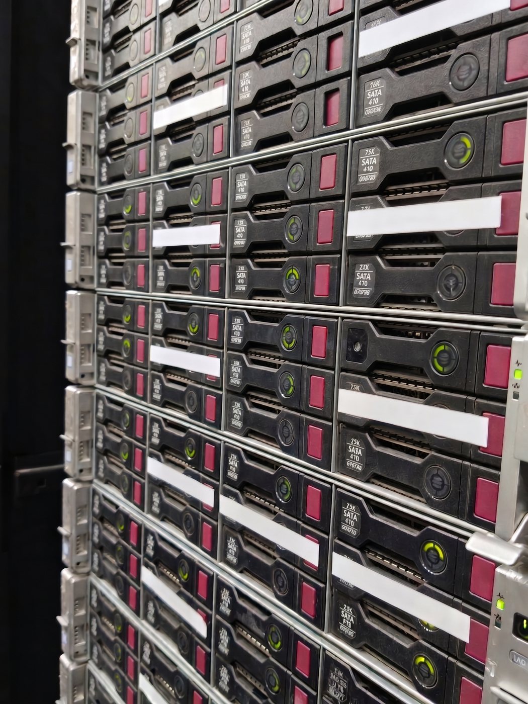 HPE ProLiant node front bezels and drive carriers in a compute rack