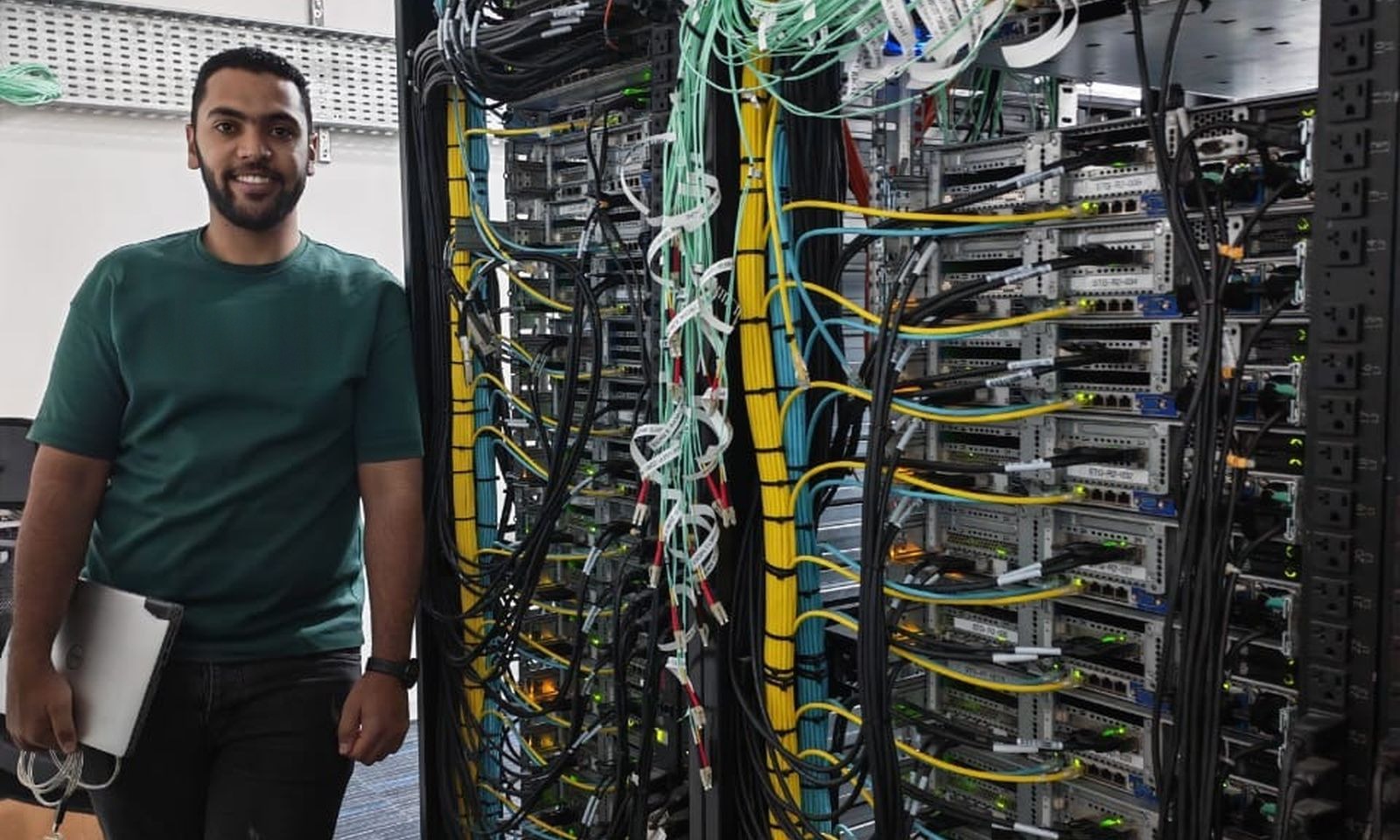A Stark Technology engineer at a live production rack